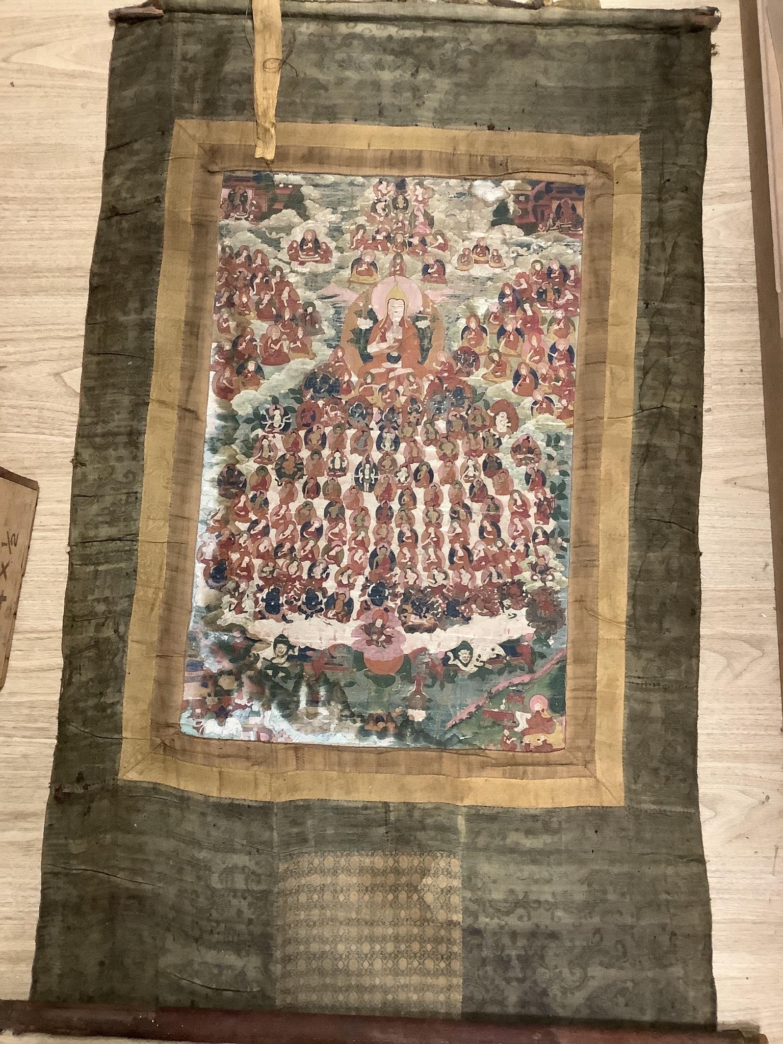 Three early Tibetan thangkas, probably 18th/19th century, each with damages and one in relic condition